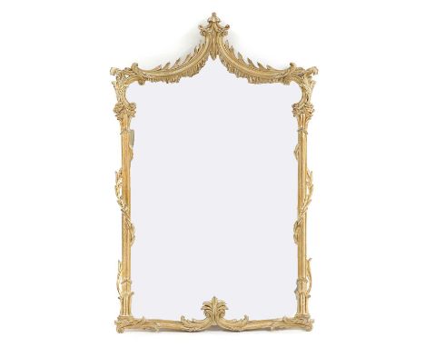 A carved wall mirror, of recent manufacture, in the Chippendale manner the rectangular plate within a shaped leaf carved fram