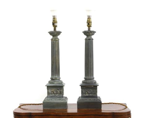 A pair of blue painted table lamps, 20th Century, of column form with pleated cream shades 77cm high (2)Condition Reportminor