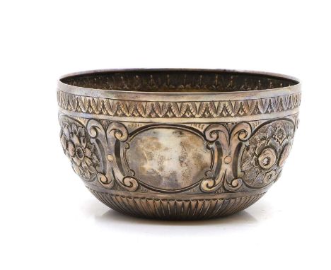 A Victorian silver bowl, by Charles Cooke, London, 1893, embossed and chased with panels of flowers, 15.5cm diameter9.8oztCon