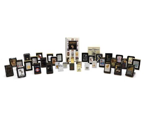 A large collection of Zippo lighters 20th century, comprising 32 examples, to include 1935 Varga Girl, Desert Fox, Poland and