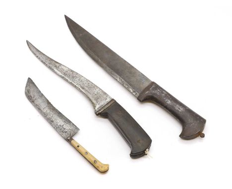 Three Indian Mughal daggers, early 19th century, comprising a pesh kabz,with wooden handle,total 28.5cm longtogether with a s