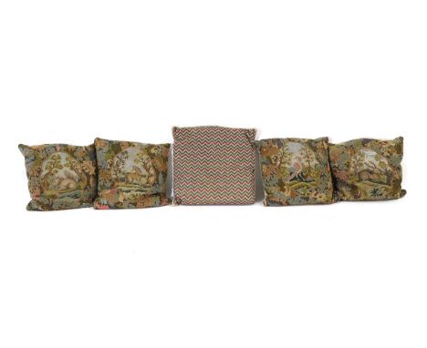 A group of four needlework cushions,  20th Century, each with folate designs, 44cm x 44cm  together with a group of four need