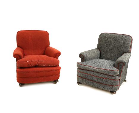 A near pair of Victorian armchairs, each with red or grey woolen fabric covers, with later seat covers, on bun pads and casto