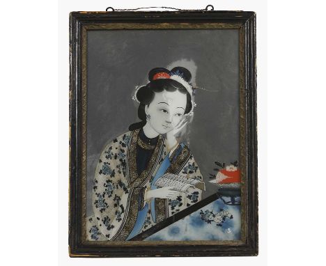 A Chinese reverse glass painting, late Qing dynasty, of a lady wearing a white-coloured silk robe decorated with sprigs of fl