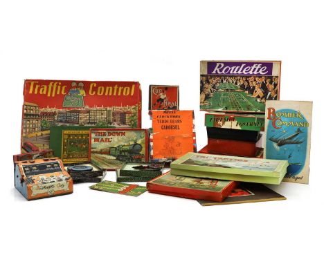 A collection of tin plate toys early 20th century and later, to include Traffic Control, Fireside Football, Meccano sets, Tab