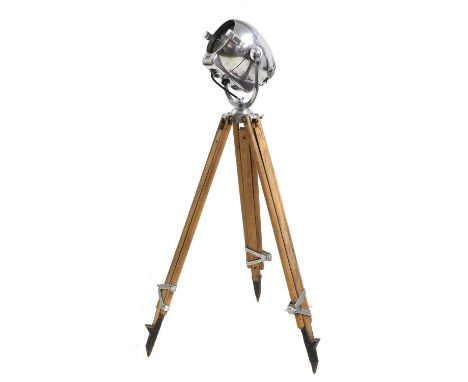 A Strand Electric theatre light 20th century, raised on an adjustable tripod, stamped 'Strand Electric',125cm highCondition R