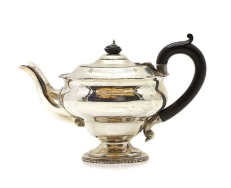A silver teapot Chester 1915, 23cm wide 16cm hightotal weight 14.9oztCondition ReportLight tarnishing. The maker's mark is ru