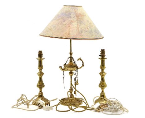 A brass table lamp  20th century, in the form of an oil lamp, with a shade, 50cm high to the fitting together with another pa