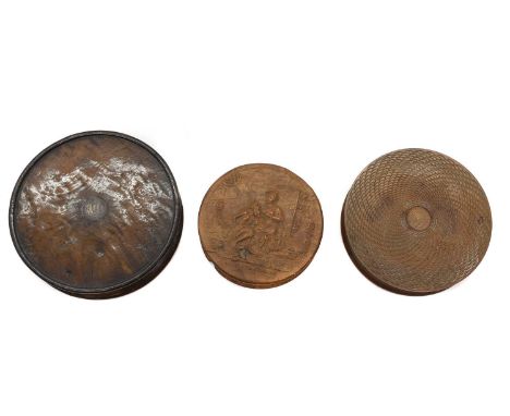 Three turned wooden table snuff boxes 19th Century, to include a French example the cover carved depicting Pero feeding Cimon