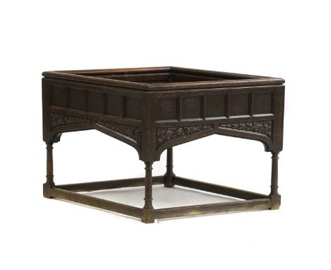 An oak jardiniere, 19th Century, of lozenge form, with gothic panelled sides, the legs united by stretchers104cm wide60cm dee