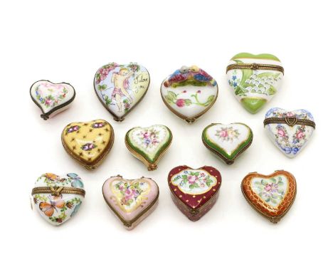 A collection of Limoges porcelain pill boxes, all of heart form with hand painted decoration  7cm largest example (12)Conditi