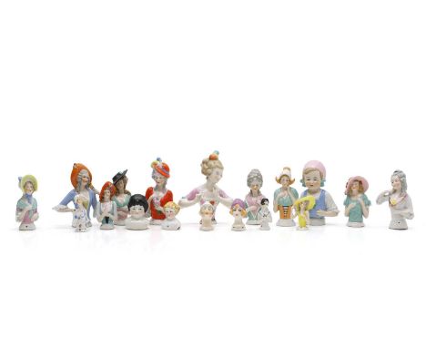 A collection of porcelain half-doll figures, 20th century, various sizes, mostly of ladies, largest 12.5cm high approx (18)Co