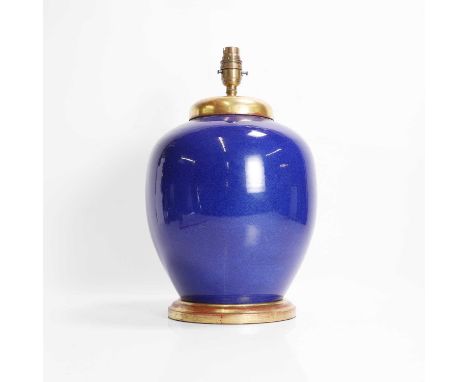 A Chinese blue-glazed jar, late Qing dynasty, of ovoid form with giltwood mounts, approximately 26cm highProvenance: The sele