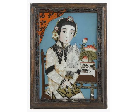 A Chinese reverse glass painting, Republic period (1912-1949), of a lady wearing a white robe decorated with endless knots, w