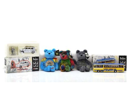 A collection of Beatles related toys comprising;three boxed Corgi toys,to include Yellow Submarine, the Magical Mystery Tour 