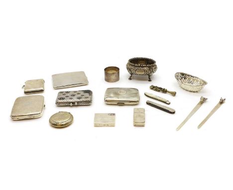 A group of silver items  comprising a silver vesta case, marks rubbed, in the form of an envelope with an enamelled stamp, 4.