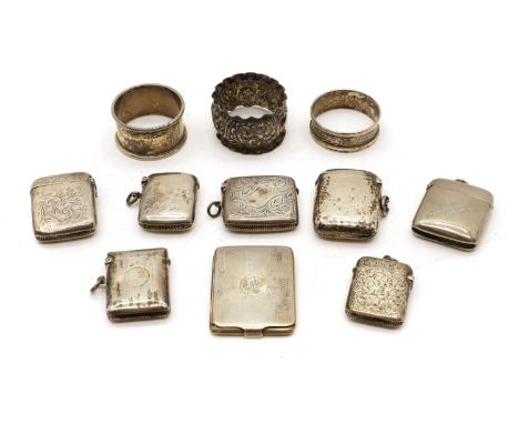 A collection of silver matchboxes, various marks;together with three silver napkin rings;and two silver-plated matchboxes,wei