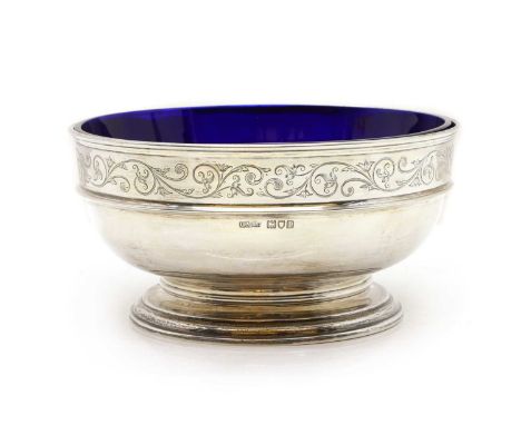 A George V silver footed bowl, Gorham Manufacturing Co, London 1910, with engraved scrolling foliate decoration to the rim, w