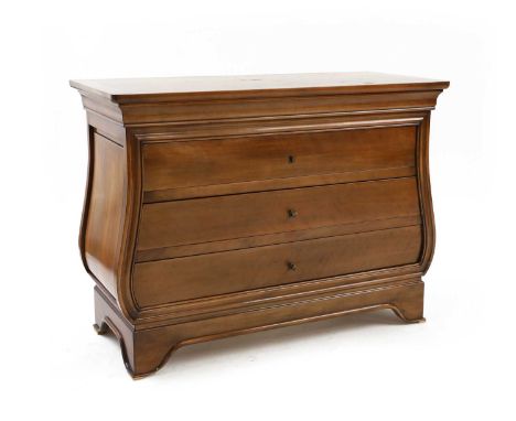 A cherrywood commode, 20th century, the rectangular top above three drawers on shaped feet 114cm wide 52cm deep 85cm high Con