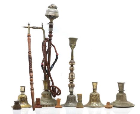 A hookah water pipe, 20th century, probably Indian, 79cm hightogether with a collection of clay coal bowls, some examples wit