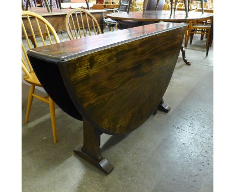 A Ercol Golden Dawn elm drop leaf table 