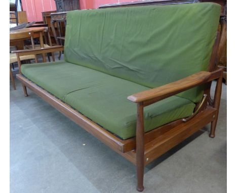 A Guy Rogers teak and green fabric upholstered settee/daybed, designed by George Fejer and Eric Phamphilon and retailed by He