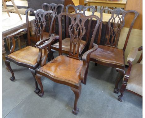 A set of five Chippendale Revival mahogany dining chairs 