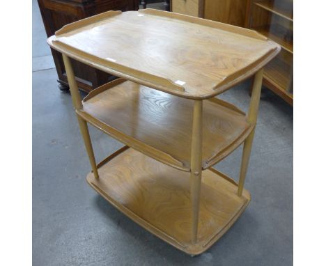 An Ercol Blond elm and beech Windsor trolley 
