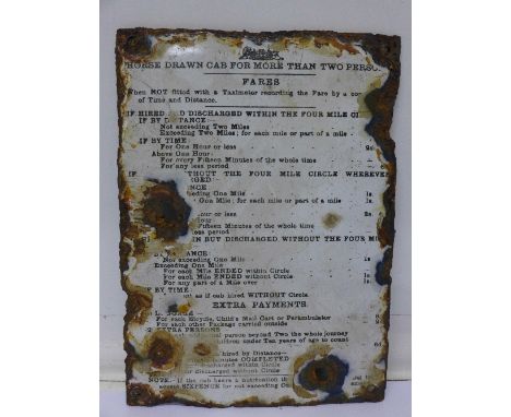 A reproduction enamel plaque displaying toll charges for horse drawn cabs, 16.5cm x 22.5cm