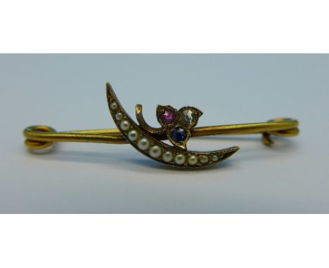 A 15ct gold, diamond, sapphire, ruby and pearl brooch, 2g