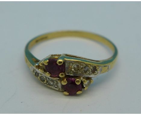 A 9ct gold, diamond and ruby ring, 1.5g, M