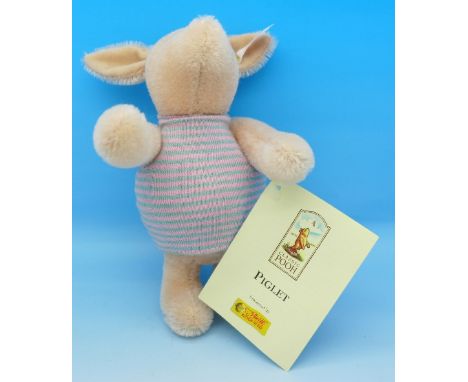 A Steiff Piglet soft toy