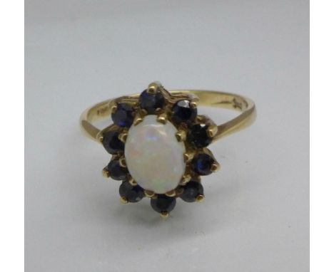 A 9ct gold, sapphire and opal cluster ring, 2.2g, M