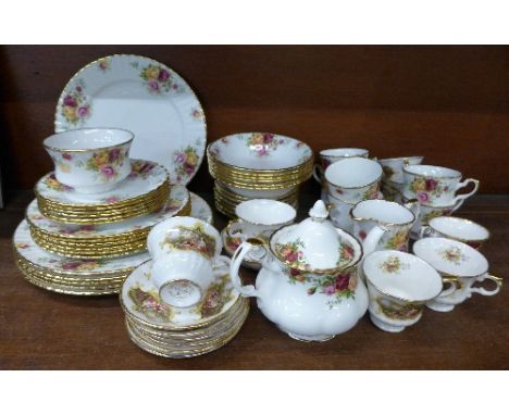 Royal Standard tea and dinnerware decorated with roses, a Royal Albert Old Country Roses teapot, and six Paragon Chippendale 
