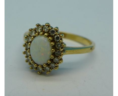 A 9ct gold, opal and diamond ring, 2.8g, P