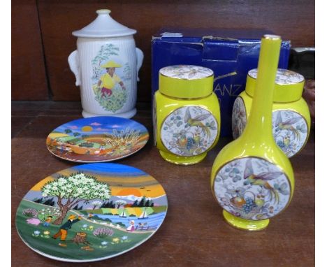 A Carlton Ware three piece set, two lidded jars and a moon flask vase, a Sylvac lidded jar, two Poole plates and a Franz jug,