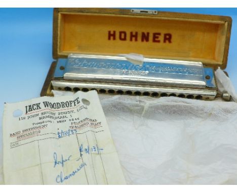 A Hohner The 64 Chromonica professional model harmonica, cased