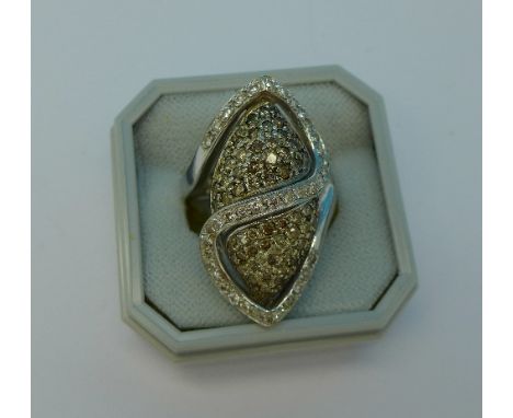 An 18ct white gold and diamond ring, 11.9g, K
