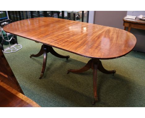 19thC Mahogany Regency Style table with 2 leaves over tripod base and brass casters 250cm in Length