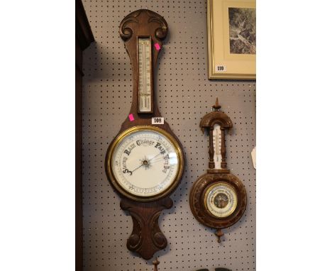 Oak Aneroid Barometer and a smaller wall barometer 