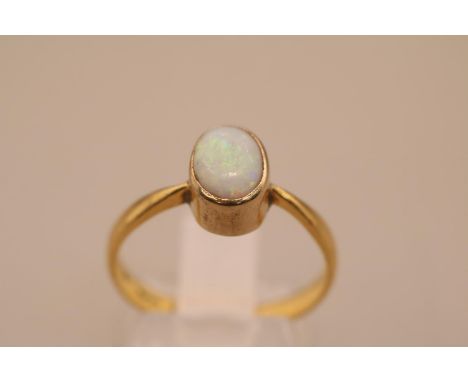 22ct Gold Oval rub over Opal ring, Size M. 3.1g total weight 