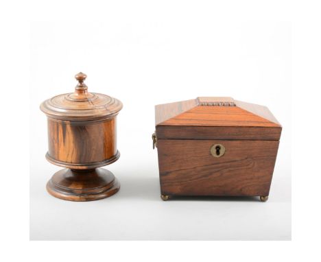 Victorian rosewood sarcophagus shape tea caddy, bun feet, ring handles, 19cm; together with an early Victorian turned lignum 