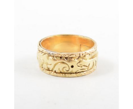 An early yellow metal ring with hunting scene around the 10mm wide band, secret compartment, finely chased border, approximat