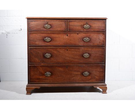 George III mahogany chest of drawers, moulded edge, fitted with two short and three long drawers, replaced ogee bracket feet,