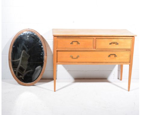 Edwardian dressing table and matching oval wall mirror, satin walnut and boxstrung ebony inlay, two short and one long drawer