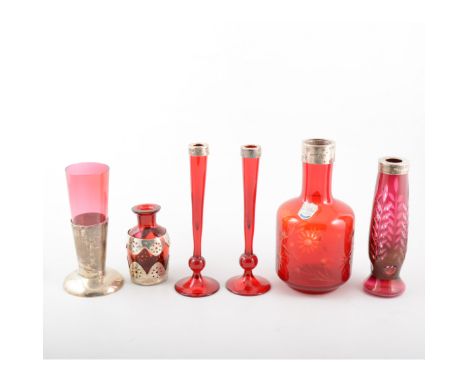 Six ruby/cranberry vases all with handmade hallmarked silver collars and mounts. (6)