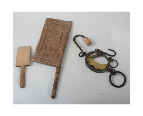 A carved wood butter pat, a brass faced spring balance scale and others, (2).