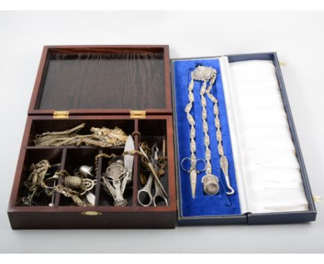 A collection of chatelaines, a modern silver chatelaine with three long chains made from rectangular plates with scissors, sm