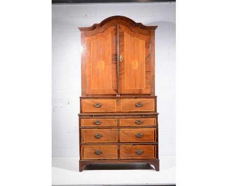 Anglo-Dutch oak and mixed wood linen press, mid 19th Century, moulded arched top, two doors enclosing shelves with a drawer o