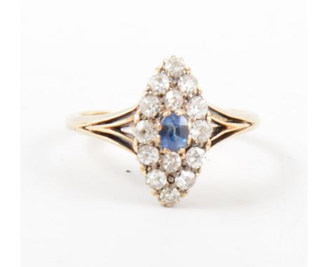 A sapphire and diamond marquise cluster ring, a single oval cut sapphire surrounded by fourteen old cut diamonds, size of hea